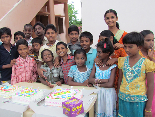 Once a month they have a birthday party to honor all the kids who have birthdays that month. Everybody loves to eat cake.