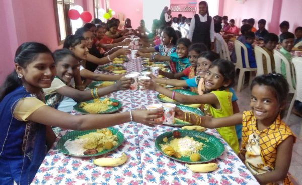 Children at Bethel Orphanage enjoy their Christmas dinner