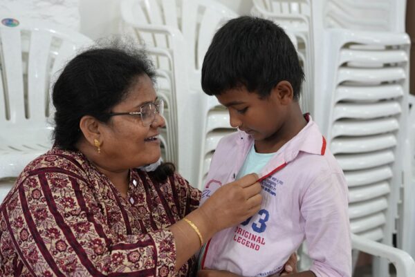 India orphan boy and orphanage director